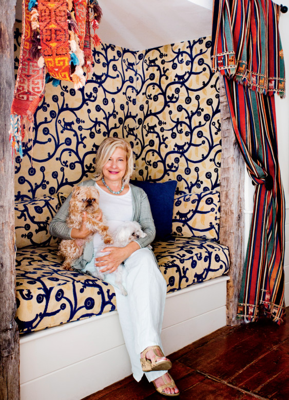 Allen and her dogs in the textile-rich living room nook.