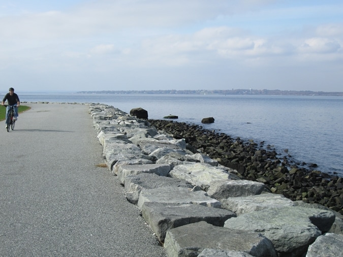 The East Bay Bike Path winds along the water's edge in Colt State Park.