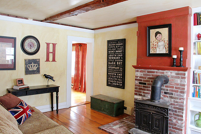 The library includes built-ins and a wood stove.