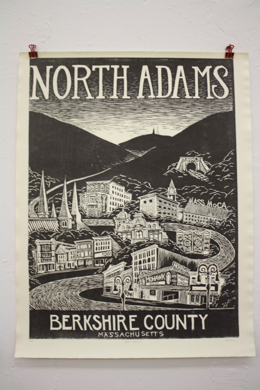 A woodcut poster by Emily Cohane-Mann, displayed at PRESS Gallery
