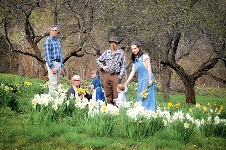 Left to right, Winslow, Marjorie, Ellie, Seth, baby Katie, and Amy Tudor. “Every year the daffodils are fruitful and multiply,” wrote Tovah Martin in Tasha Tudor’s Garden, “until the lower field is an enthusiastic rhapsody in yellow and white.”