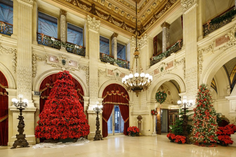 The grand poinsettia tree in The Great Hall at The Breakers.