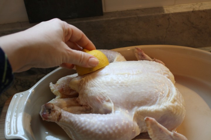 Lemon juice cleans, flavors, and tenderizes the chicken.