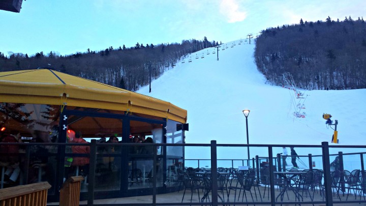 Enjoy a beer or a snack at the Roaring Brook Umbrella Bar after a long day on the slopes. 