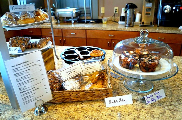 The White Apron Cafe offers freshly baked muffins, cookies, and other delicious treats.
