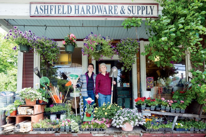 Owners Laura Bessette (left) and Nancy Hoff (right) stock the Ashfield Hardware & Supply porch with pots, plants, and garden goods.