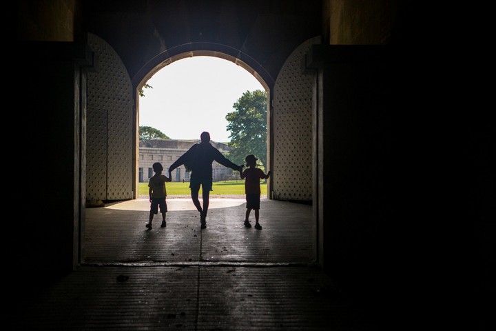 A family explores Fort Warren on George's Island.