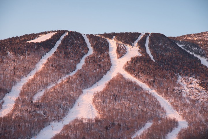Sunlight washes over the slopes on Mount Mansfield.