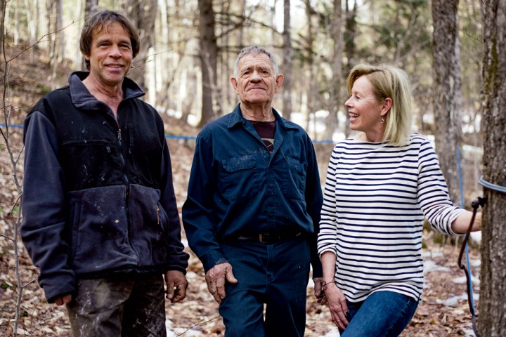 Dave Hartshorn at left with his father, Paul Hartshorn, and marketing partner Dori Ross at the Hartshorn sugarbush outside Waitsfield, Vermont.