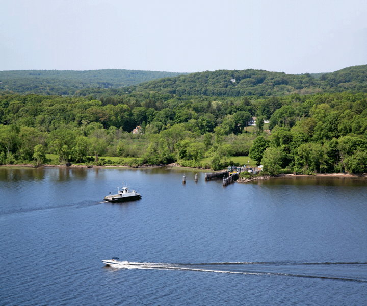 From Gillette Castle, a sweeping view takes in the historic Chester Hadlyme Ferry crossing the Connecticut River. 
