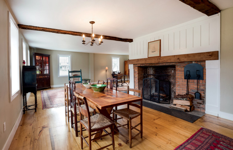While one of the five restored fireplaces brings an air of coziness to the dining area, the real heat in this house comes from a cutting-edge electric heat pump and gas-fired furnace.