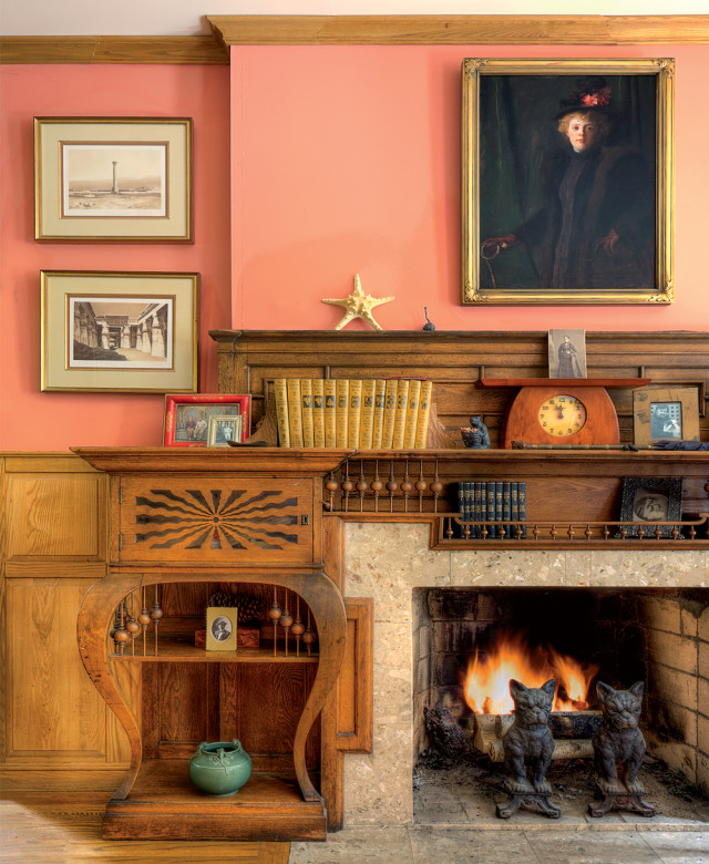 A salvaged period mantel graces the parlor in the Swan’s Island house.