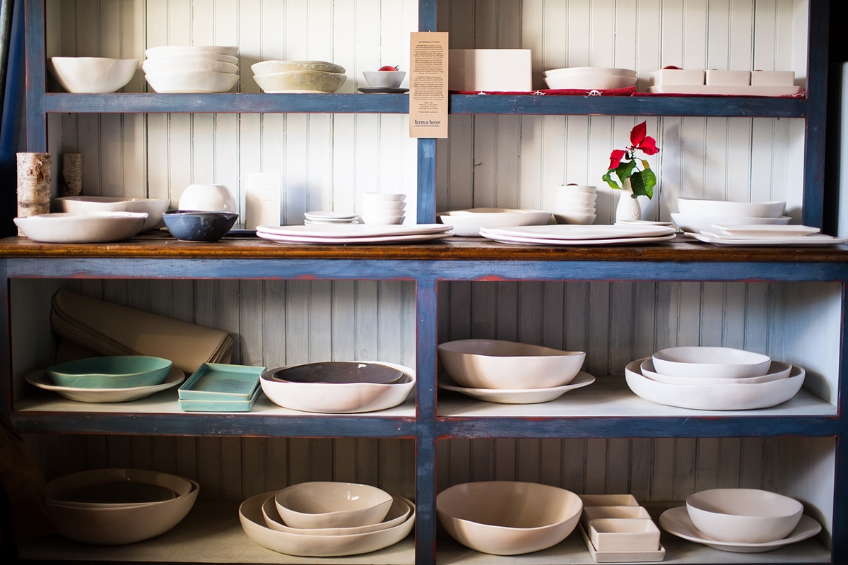 Pottery lines the shelves at Farm and Home on Main Street.