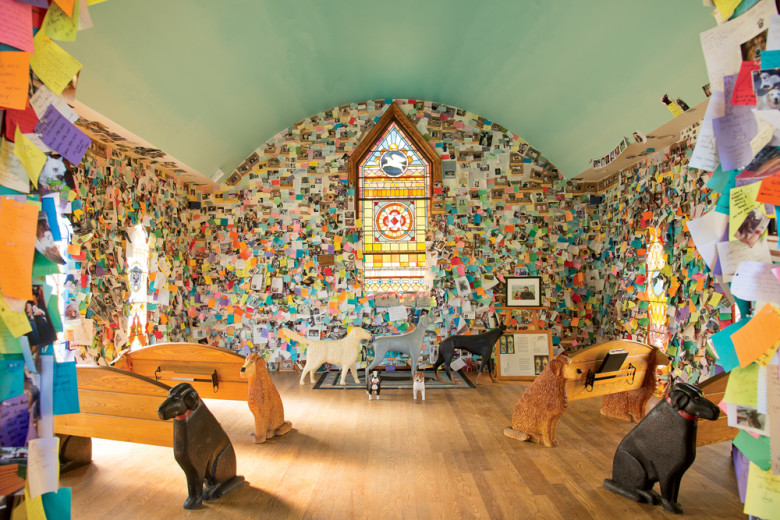 At St. Johnsbury’s Dog Mountain, notes and photos memorializing beloved pets fill this one-of-a-kind chapel, whose welcome sign reads “All Creeds/All Breeds/No Dogmas Allowed.”