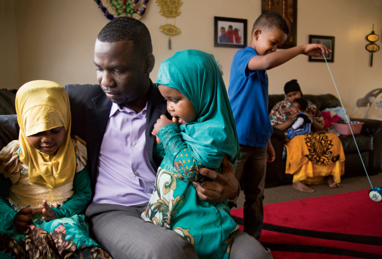 Named to the local chamber of commerce’s “40 Under 40” list last spring, Abdikadir Negeye balances a demanding job at Maine Immigrant and Refugee Services with a full house at home. Here he embraces daughters Samia and Siham, as his wife, Ikran, tends to their infant son, Jaseem. Meanwhile, son Jamal shows off his yo-yo skills.