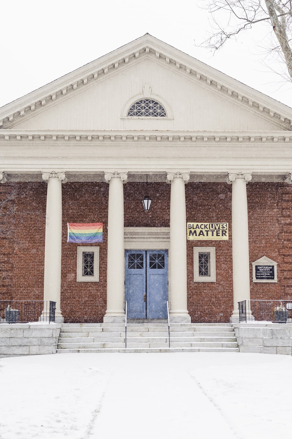 The front facade of the Unitarian Society of Northampton and Florence speaks to its inclusivity.