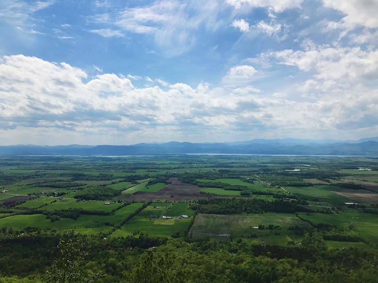 Gaze out at the patchwork of the Champlain Valley from the top of Snake Mountain