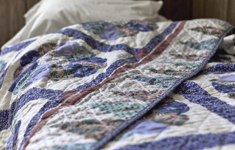 Quilt on top of Bedspread