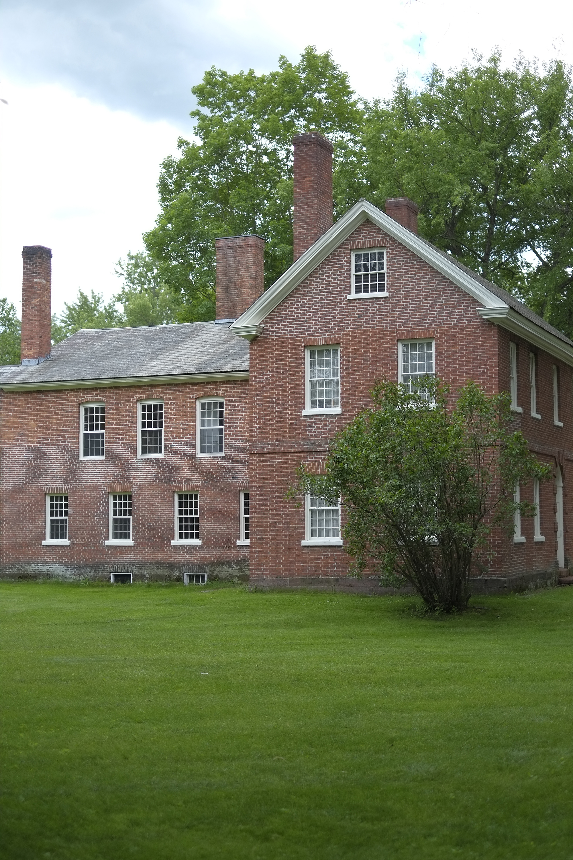 The brick exterior of Stebbins House circa 1799 offers self-guided tours showcasing Federal period furnishings.