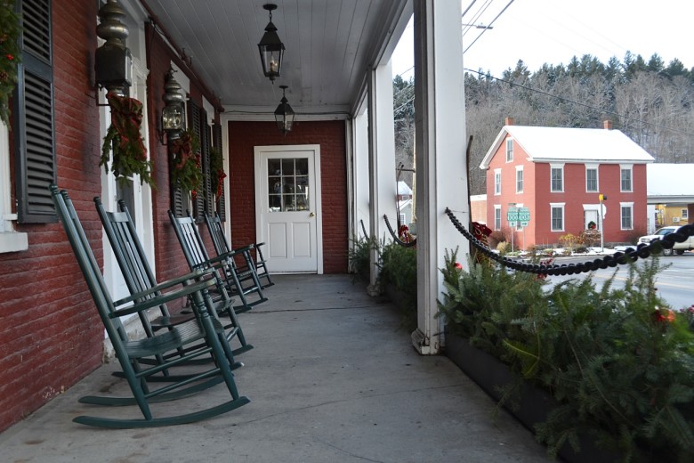 Rocking chairs at the Green Mountain Inn on Main Street. Most Haunted Hotels in New England